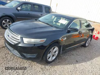 2013 Ford Taurus SEL with VIN 1FAHP2E83DG139440, listed as a IAAI auction lot 41887873 with 251,062 mi miles and . Bid and sale history available at carsss.com. Image 2.