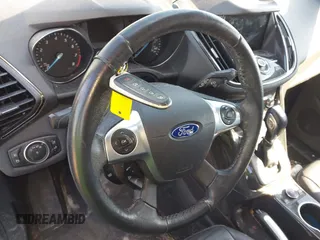 2016 Ford Escape Titanium with VIN 1FMCU9JX5GUA65412, listed as a IAAI auction lot 41859123 with 80,208 mi miles and . Bid and sale history available at DreamBid. Image 11.