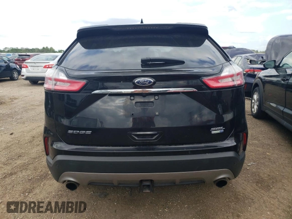 2020 Ford Edge SEL with VIN 2FMPK4J90LBA17571, listed as a Copart auction lot 60316135 with 92,546 mi miles and Salvage title. Bid and sale history available at DreamBid. Image 6.