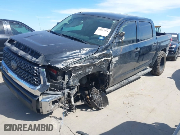 2018 Toyota Tundra SR5 z VIN 5TFDW5F12JX694518, wystawiony jako IAAI lot #41663831 z przebiegiem 183 220 mil mil oraz . Historia ofert i sprzedaży dostępna na DreamBid. Obrazek 18.
