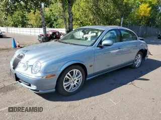 2003 Jaguar S-Type with VIN SAJEA01U53HM73131, listed as a Copart auction lot 73430914 with 72,730 mi miles and Salvage Title. Bid and sale history available at DreamBid. Image 1.