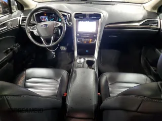 2019 Ford Fusion Hybrid SEL with VIN 3FA6P0MU5KR149757, listed as a Copart auction lot 67573034 with 64,695 mi miles and Salvage Title. Bid and sale history available at carsss.com. Image 8.