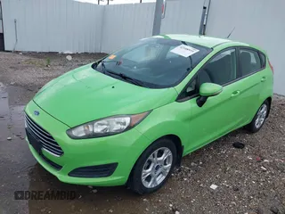 2014 Ford Fiesta SE z VIN 3FADP4EJ8EM233754, wystawiony jako IAAI lot #42108955 z przebiegiem 113 325 mil mil oraz . Historia ofert i sprzedaży dostępna na DreamBid. Obrazek 2.
