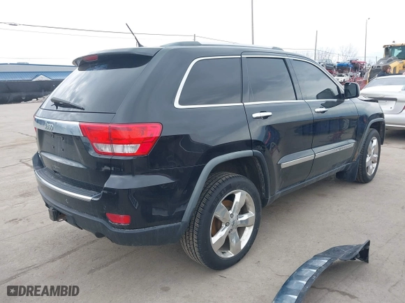 2012 Jeep Grand Cherokee Overland with VIN 1C4RJFCG3CC148601, listed as a IAAI auction lot 41717658 with 127,681 mi miles. Bid and sale history available at carsss.com. Image 4.