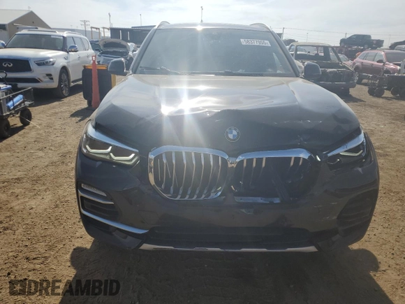 2020 BMW X5 xDrive40i with VIN 5UXCR6C08LLL83222, listed as a Copart auction lot 58377955 with 38,854 mi miles and Salvage title. Bid and sale history available at DreamBid. Image 5.