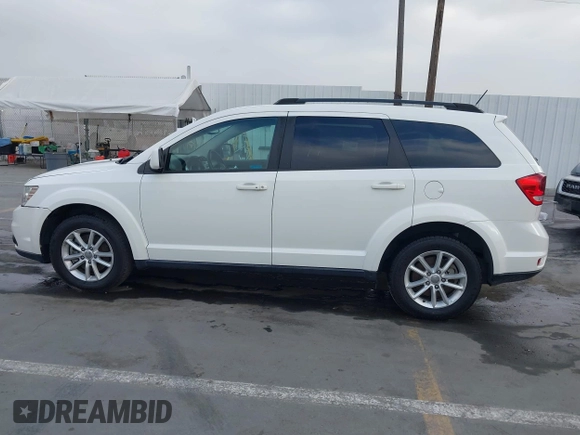 2015 Dodge Journey SXT with VIN 3C4PDDBG9FT600712, listed as a IAAI auction lot 42090741 with 111,741 mi miles and . Bid and sale history available at DreamBid. Image 14.