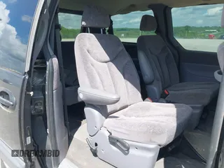 1999 Dodge Grand Caravan with VIN 1B4GP54GXXB897614, listed as a IAAI auction lot 42141997 with 157,698 mi miles and . Bid and sale history available at DreamBid. Image 8.