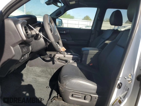 2023 Toyota Tacoma SR z VIN 3TMCZ5AN5PM647530, wystawiony jako Copart lot #54549125 z przebiegiem 8 992 mil mil oraz Szkoda całkowita • Salvage title. Historia ofert i sprzedaży dostępna na DreamBid. Obrazek 7.