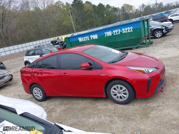 2021 Toyota Prius L Eco with VIN JTDKAMFU6M3134586, listed as a IAAI auction lot 41909538 with 55,355 mi miles. Bid and sale history available at carsss.com. Image 13.