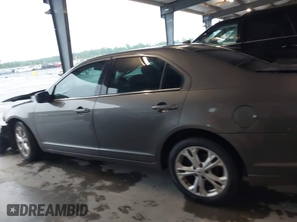 2012 Ford Fusion SE with VIN 3FAHP0HA8CR407618, listed as a IAAI auction lot 42199709 with 124,924 mi miles and . Bid and sale history available at DreamBid. Image 14.