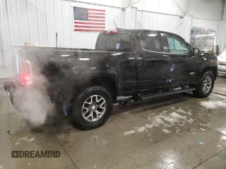 2015 GMC Canyon 4WD SLE with VIN 1GTG6BE35F1119242, listed as a Copart auction lot 87260474 with 184,286 mi miles and Clean Title. Bid and sale history available at carsss.com. Image 3.