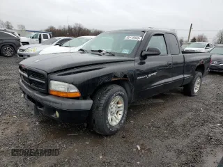 2001 Dodge Dakota Sport z VIN 1B7GL22N31S137577, wystawiony jako Copart lot #50119405 z przebiegiem Nie podano mil oraz Czysty tytuł • Clean title. Historia ofert i sprzedaży dostępna na DreamBid. Obrazek 1.