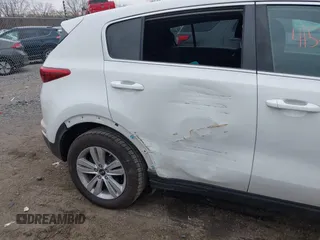 2018 Kia Sportage LX with VIN KNDPM3AC4J7315826, listed as a IAAI auction lot 41521362 with 130,628 mi miles and . Bid and sale history available at DreamBid. Image 6.