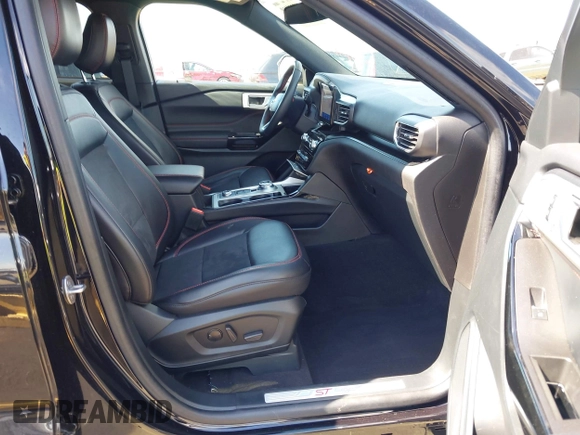 2023 Ford Explorer ST-Line z VIN 1FMSK8KH7PGC03436, wystawiony jako IAAI lot #42359119 z przebiegiem 5 261 mil mil oraz . Historia ofert i sprzedaży dostępna na DreamBid. Obrazek 5.