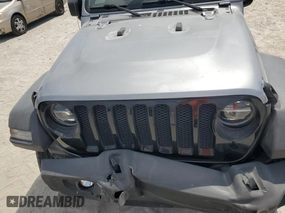 2020 Jeep Wrangler Unlimited Willys with VIN 1C4HJXDG7LW186671, listed as a Copart auction lot 54090865 with 67,882 mi miles and Salvage title. Bid and sale history available at DreamBid. Image 12.