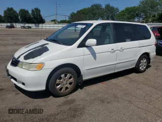 2002 Honda Odyssey EX with VIN 2HKRL18662H562178, listed as a Copart auction lot 63787995 with 256,072 mi miles and Salvage title. Bid and sale history available at DreamBid. Image 1.