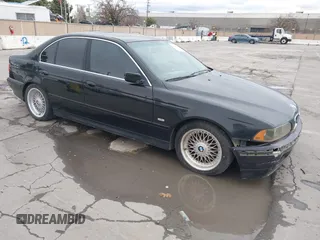 2001 BMW 5 Series 525iA with VIN WBADT43451GX20026, listed as a IAAI auction lot 41490075 with 141,700 mi miles. Bid and sale history available at carsss.com. Image 1.