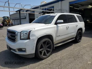 2015 GMC Yukon SLT z VIN 1GKS2BKC9FR100726, wystawiony jako Copart lot #59631515 z przebiegiem 168 147 mil mil oraz Szkoda całkowita • Salvage title. Historia ofert i sprzedaży dostępna na DreamBid. Obrazek 1.