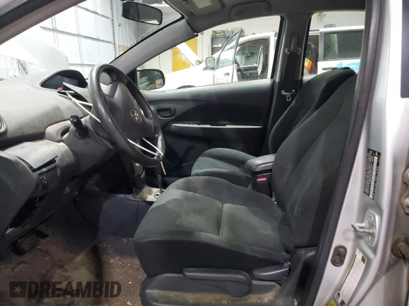 2012 Toyota Yaris with VIN JTDBT4K39C1415296, listed as a Copart auction lot 44793505 with 205,365 mi miles and Salvage Title. Bid and sale history available at DreamBid. Image 7.
