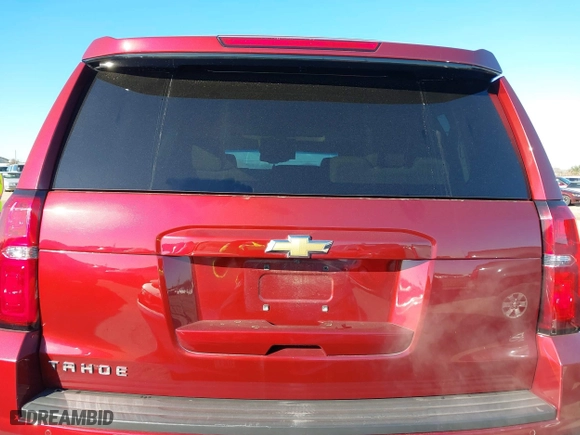2019 Chevrolet Tahoe LT with VIN 1GNSKBKC3KR377093, listed as a IAAI auction lot 41300728 with 76,023 mi miles. Bid and sale history available at carsss.com. Image 16.