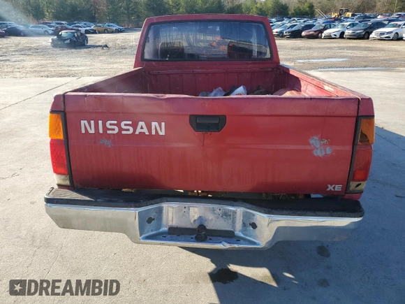 1989 Nissan Hardbody z VIN 1N6ND11S9KC399764, wystawiony jako Copart lot #87067574 z przebiegiem 87 990 mil mil oraz Szkoda całkowita • Salvage title. Historia ofert i sprzedaży dostępna na DreamBid. Obrazek 6.