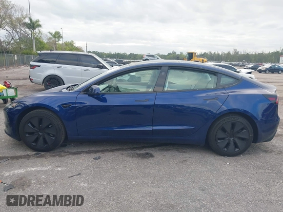 2025 Tesla Model 3 Long Range with VIN 5YJ3E1EA2SF919461, listed as a IAAI auction lot 41672494 with 777 mi miles and . Bid and sale history available at DreamBid. Image 14.