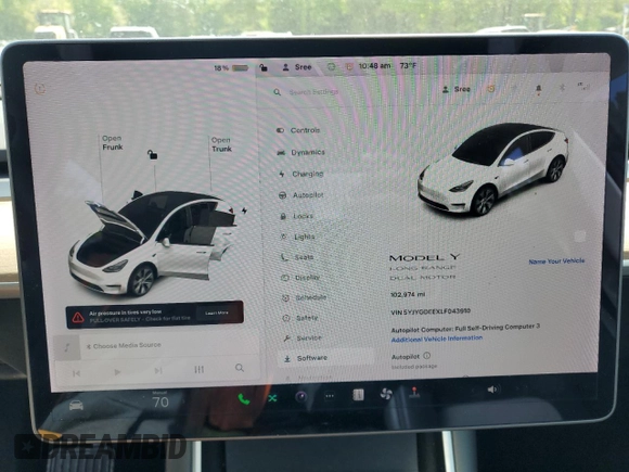 2020 Tesla Model Y Long Range z VIN 5YJYGDEEXLF043910, wystawiony jako Copart lot #54007745 z przebiegiem 102 974 mil mil oraz Szkoda całkowita • Salvage title. Historia ofert i sprzedaży dostępna na DreamBid. Obrazek 9.
