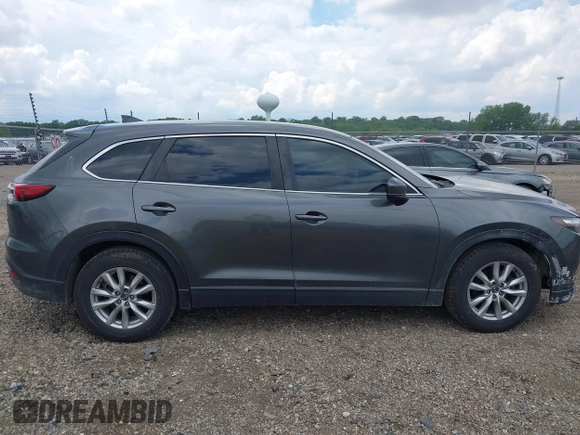 2016 Mazda CX-9 Sport z VIN JM3TCABYXG0126543, wystawiony jako IAAI lot #42256448 z przebiegiem 133 813 mil mil oraz . Historia ofert i sprzedaży dostępna na DreamBid. Obrazek 13.