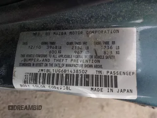 2011 Mazda 3 i Sport with VIN JM1BL1UG6B1438502, listed as a IAAI auction lot 41950959 with 131,856 mi miles and . Bid and sale history available at DreamBid. Image 9.