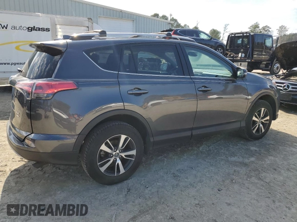2018 Toyota RAV4 XLE with VIN 2T3RFREV3JW848384, listed as a Copart auction lot 88758945 with 28,951 mi miles and Salvage Title. Bid and sale history available at DreamBid. Image 3.