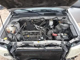 2011 Mazda Tribute Touring with VIN 4F2CY0C73BKM07056, listed as a Copart auction lot 85149404 with 138,265 mi miles and Salvage Title. Bid and sale history available at carsss.com. Image 12.