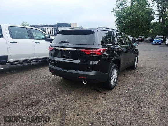 2022 Chevrolet Traverse LT with VIN 1GNERHKW6NJ133009, listed as a IAAI auction lot 42634836 with 90,143 mi miles and . Bid and sale history available at DreamBid. Image 4.
