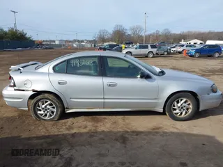 2004 Pontiac Grand Am SE1 with VIN 1G2NF52E24C239133, listed as a IAAI auction lot 41458613 with 149,815 mi miles and . Bid and sale history available at DreamBid. Image 13.
