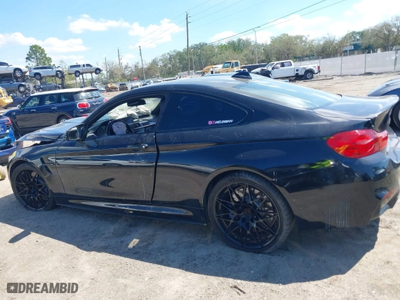 2016 BMW M4 with VIN WBS3R9C51GK708621, listed as a IAAI auction lot 41678133 with 59,501 mi miles. Bid and sale history available at carsss.com. Image 14.