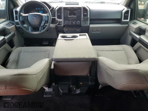2016 Ford F-150 XLT with VIN 1FTEW1C86GKD79757, listed as a Copart auction lot 54757115 with 161,535 mi miles and Salvage title. Bid and sale history available at DreamBid. Image 8.