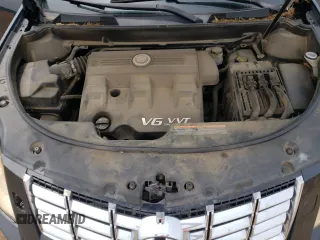 2014 Cadillac SRX Performance Collection z VIN 3GYFNCE38ES525883, wystawiony jako Copart lot #55085505 z przebiegiem 160 609 mil mil oraz Szkoda całkowita • Salvage title. Historia ofert i sprzedaży dostępna na DreamBid. Obrazek 12.