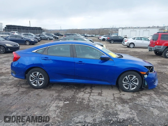 2018 Honda Civic LX with VIN 2HGFC2F59JH610350, listed as a IAAI auction lot 41892911 with 115,501 mi miles and . Bid and sale history available at DreamBid. Image 14.