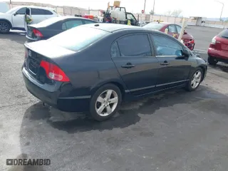 2007 Honda Civic Sdn EX with VIN 1HGFA16887L057776, listed as a IAAI auction lot 41901128 with 261,299 mi miles. Bid and sale history available at carsss.com. Image 4.