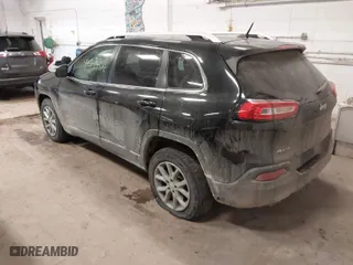 2014 Jeep Cherokee Latitude with VIN 1C4PJMCS0EW321380, listed as a IAAI auction lot 41597508 with 173,991 mi miles. Bid and sale history available at carsss.com. Image 3.