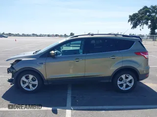 2013 Ford Escape SE with VIN 1FMCU0G99DUC05901, listed as a IAAI auction lot 42194672 with 121,435 mi miles and . Bid and sale history available at DreamBid. Image 15.
