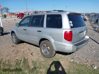 2003 Honda Pilot EX with VIN 2HKYF18683H566060, listed as a IAAI auction lot 42019115 with 182,256 mi miles. Bid and sale history available at carsss.com. Image 3.