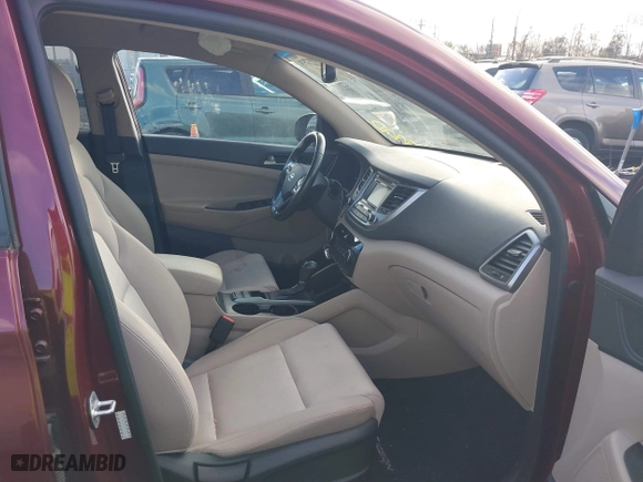 2017 Hyundai Tucson Value with VIN KM8J33A25HU530459, listed as a IAAI auction lot 40889753 with 62,223 mi miles. Bid and sale history available at carsss.com. Image 5.