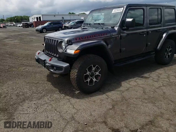 2018 Jeep Wrangler Unlimited Rubicon with VIN 1C4HJXFG1JW261472, listed as a Copart auction lot 63259345 with 60,457 mi miles and Salvage title. Bid and sale history available at DreamBid. Image 13.