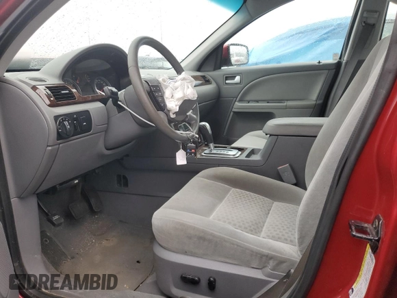 2005 Ford Five Hundred SEL with VIN 1FAFP24105G158704, listed as a Copart auction lot 76884564 with 0 mi miles and Clean Title. Bid and sale history available at carsss.com. Image 7.