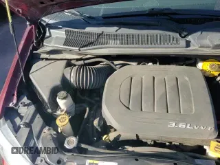 2018 Dodge Grand Caravan SXT with VIN 2C4RDGCG1JR297512, listed as a Copart auction lot 84973275 with 76,009 mi miles and Salvage title. Bid and sale history available at DreamBid. Image 14.