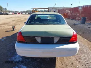 2005 Ford Police Interceptor z VIN 2FAFP71WX5X164985, wystawiony jako IAAI lot #41363721 z przebiegiem 147 950 mil mil oraz . Historia ofert i sprzedaży dostępna na DreamBid. Obrazek 16.
