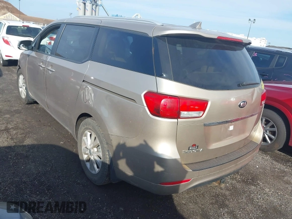 2015 Kia Sedona LX with VIN KNDMB5C15F6044093, listed as a IAAI auction lot 41843977 with 169,157 mi miles. Bid and sale history available at carsss.com. Image 3.