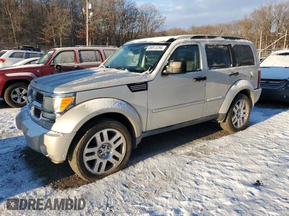 2008 Dodge Nitro SLT z VIN 1D8GU58K68W211350, wystawiony jako Copart lot #86813294 z przebiegiem Nie podano mil oraz Szkoda całkowita • Salvage title. Historia ofert i sprzedaży dostępna na DreamBid. Obrazek 1.
