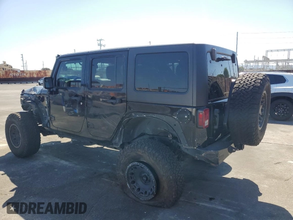 2014 Jeep Wrangler Unlimited Sahara z VIN 1C4BJWEG4EL164226, wystawiony jako Copart lot #53849355 z przebiegiem 82 145 mil mil oraz Szkoda całkowita • Salvage title. Historia ofert i sprzedaży dostępna na DreamBid. Obrazek 2.