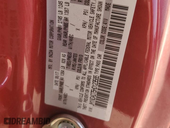 2017 Mazda MX-5 Miata Grand Touring z VIN JM1NDAD75H0123585, wystawiony jako Copart lot #50301715 z przebiegiem Nie podano mil oraz Szkoda całkowita • Salvage title. Historia ofert i sprzedaży dostępna na DreamBid. Obrazek 12.